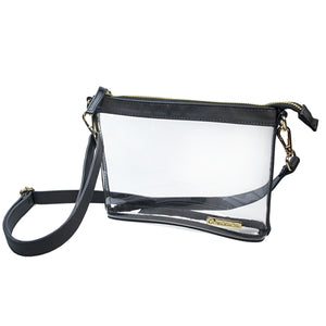 This is a Capri Designs clear stadium bag with a removable strap and black leather accents.