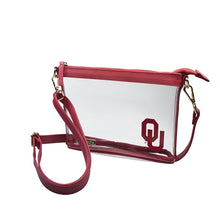 Load image into Gallery viewer, This is a Capri Designs clear bag with a removable strap and burgundy accents with the University of Oklahoma logo in the corner.  Go Sooners!