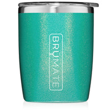 Load image into Gallery viewer, This is a Brumate Rocks Glass in Glitter Peacock, a 12 oz stainless lowball tumbler in a shimmery teal color.